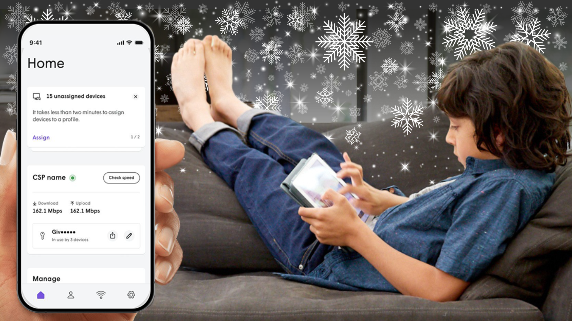 boy sitting on the couch using a device connected to the Managed Wifi system